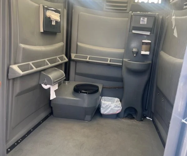 ADA-Porta-Potty.--rotated-qy15skwub6oqemt875a8tvs40jv6eq2zqxybamp66g